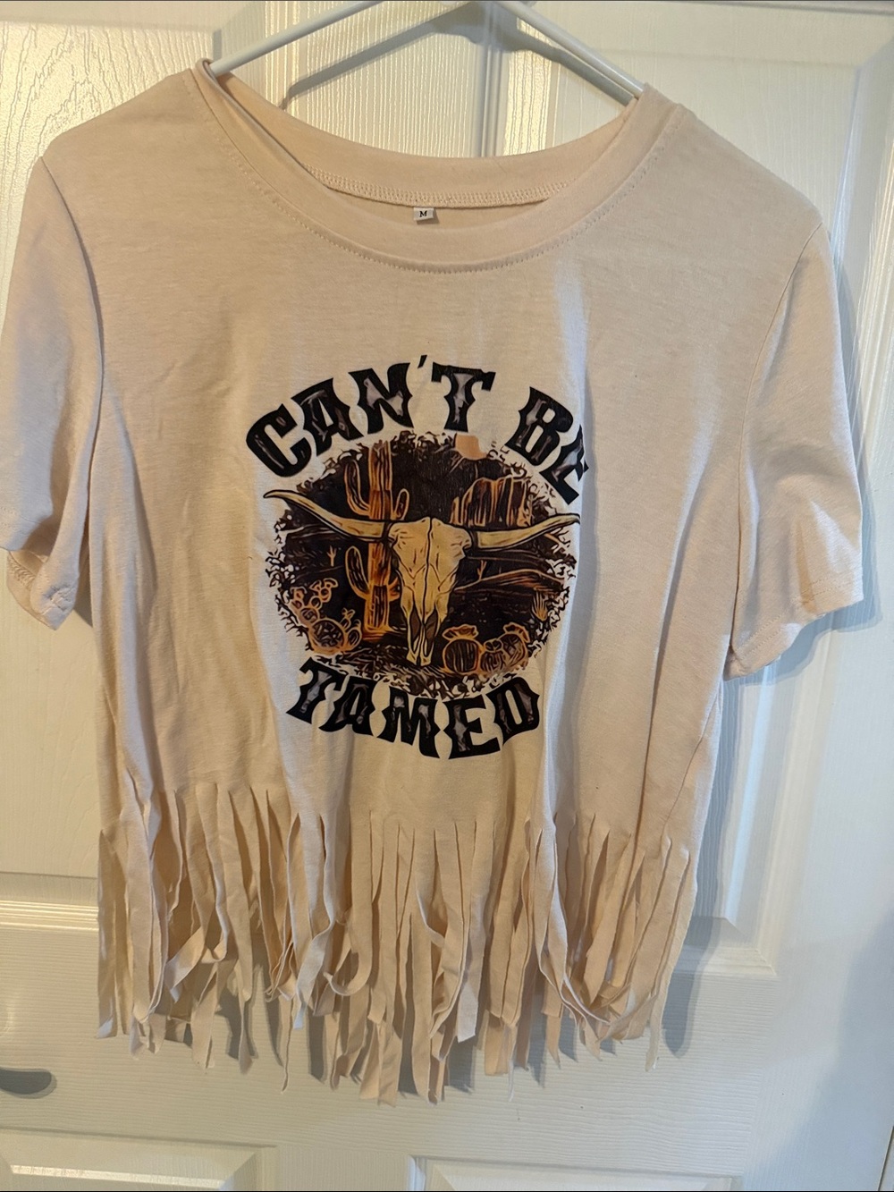 Cream 'Can't Be Tamed' Fringe Graphic Tee